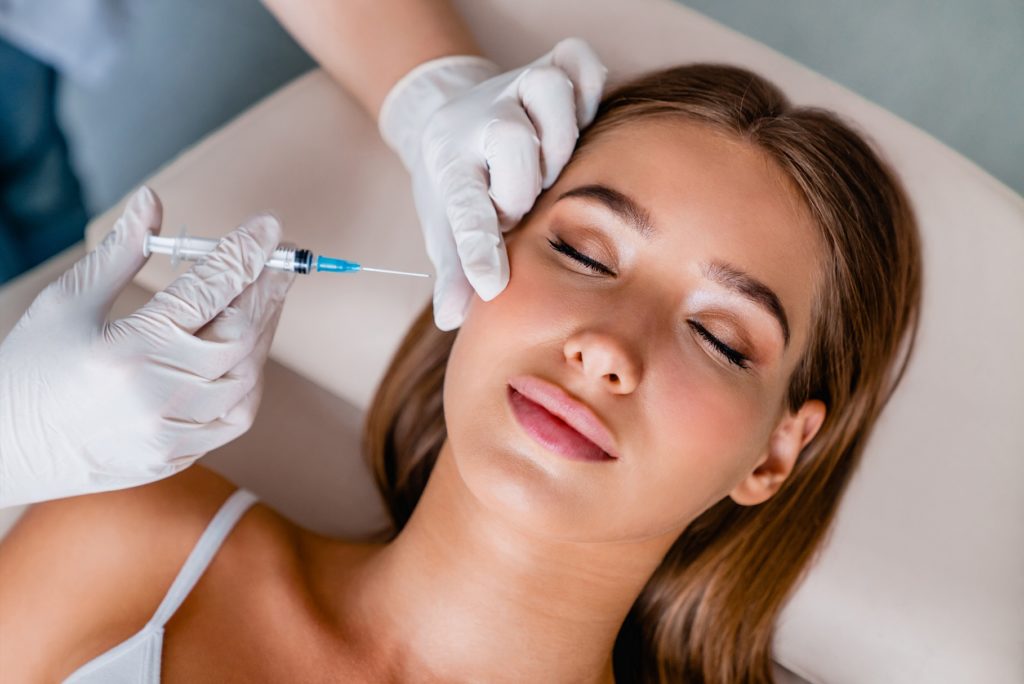 Young woman gets beauty facial injections | Healthy Glow Medical in Orlando, FL